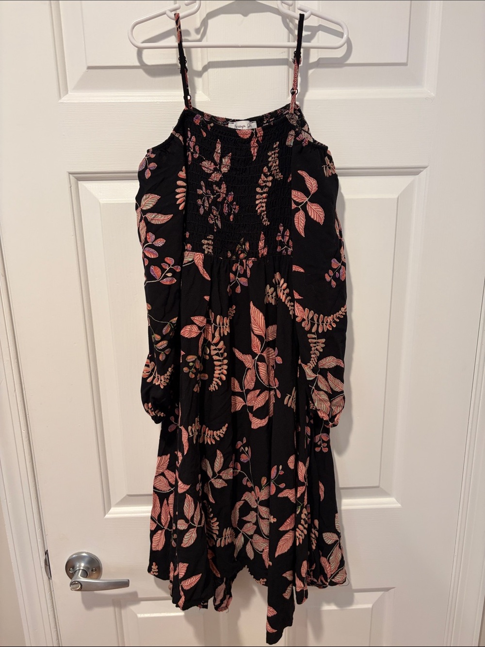 Girls black floral dress size M. Spaghetti straps with long sleeves attached